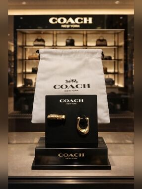 Coach Gold Tone Hoop and Crystal Accent Earrings